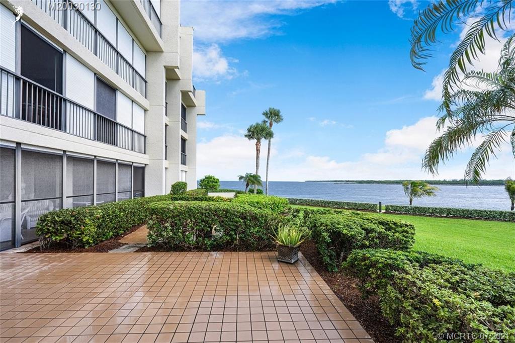2824 Southeast Dune Drive, Unit 2102 Jensen Beach, FL 34957 - Photo 28 of 40 a view of a garden with a pathway
