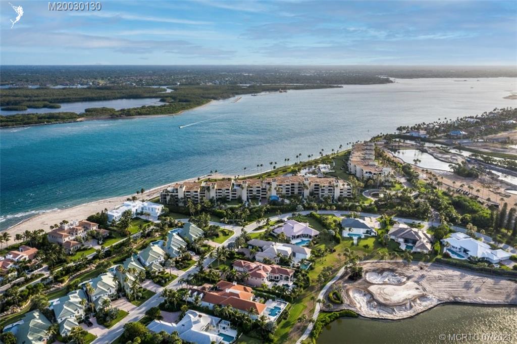 2824 Southeast Dune Drive, Unit 2102 Jensen Beach, FL 34957 - Photo 37 of 40 a view of a lake with a city