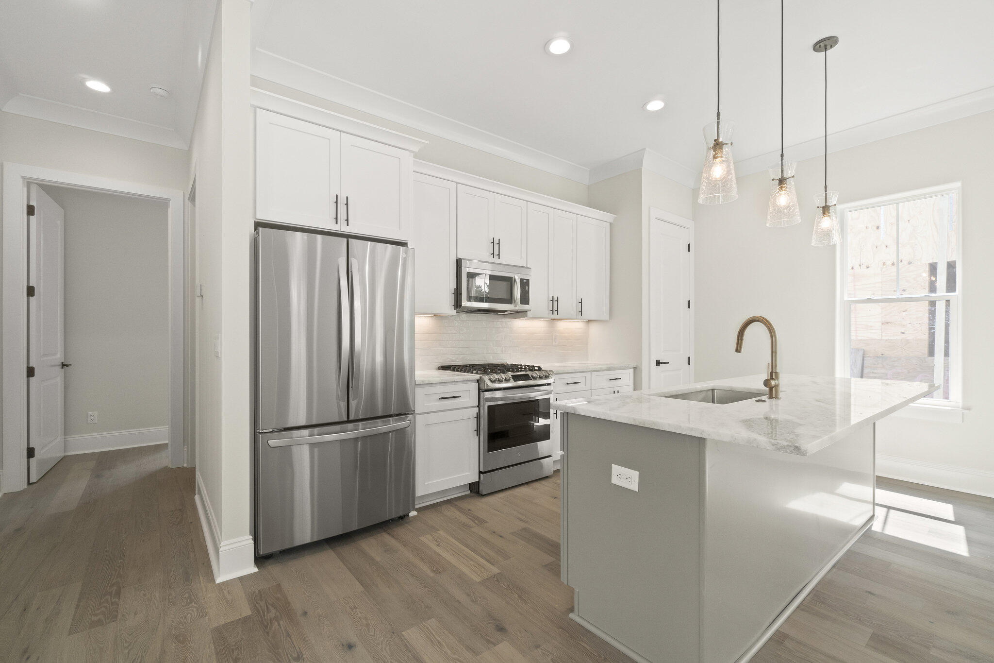25 Sunset Key Inlet Beach, FL 32461 - Photo 13 of 32 a kitchen with stainless steel appliances granite countertop a refrigerator a sink a stove and a wooden floors