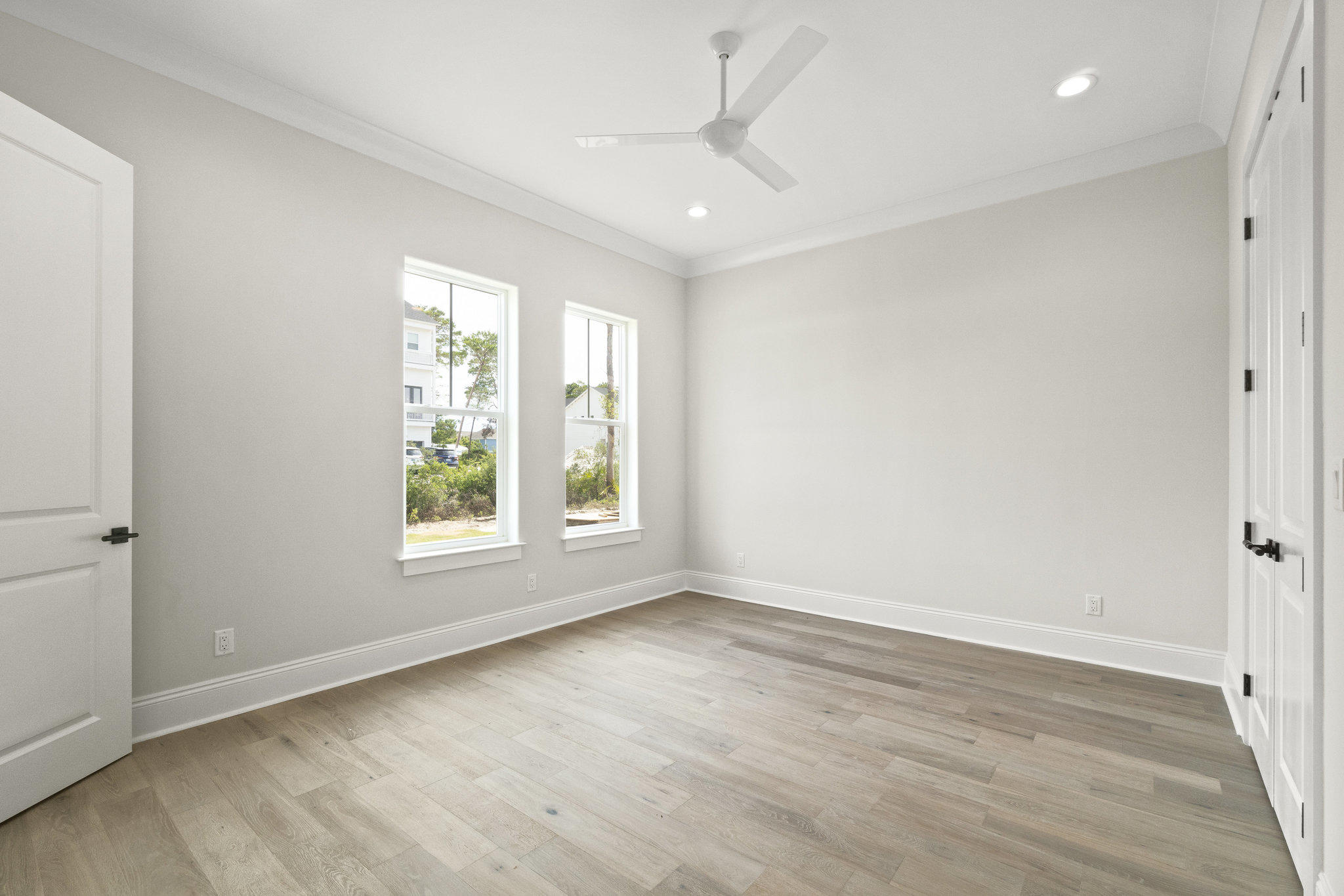 25 Sunset Key Inlet Beach, FL 32461 - Photo 14 of 32 an empty room with wooden floor and windows