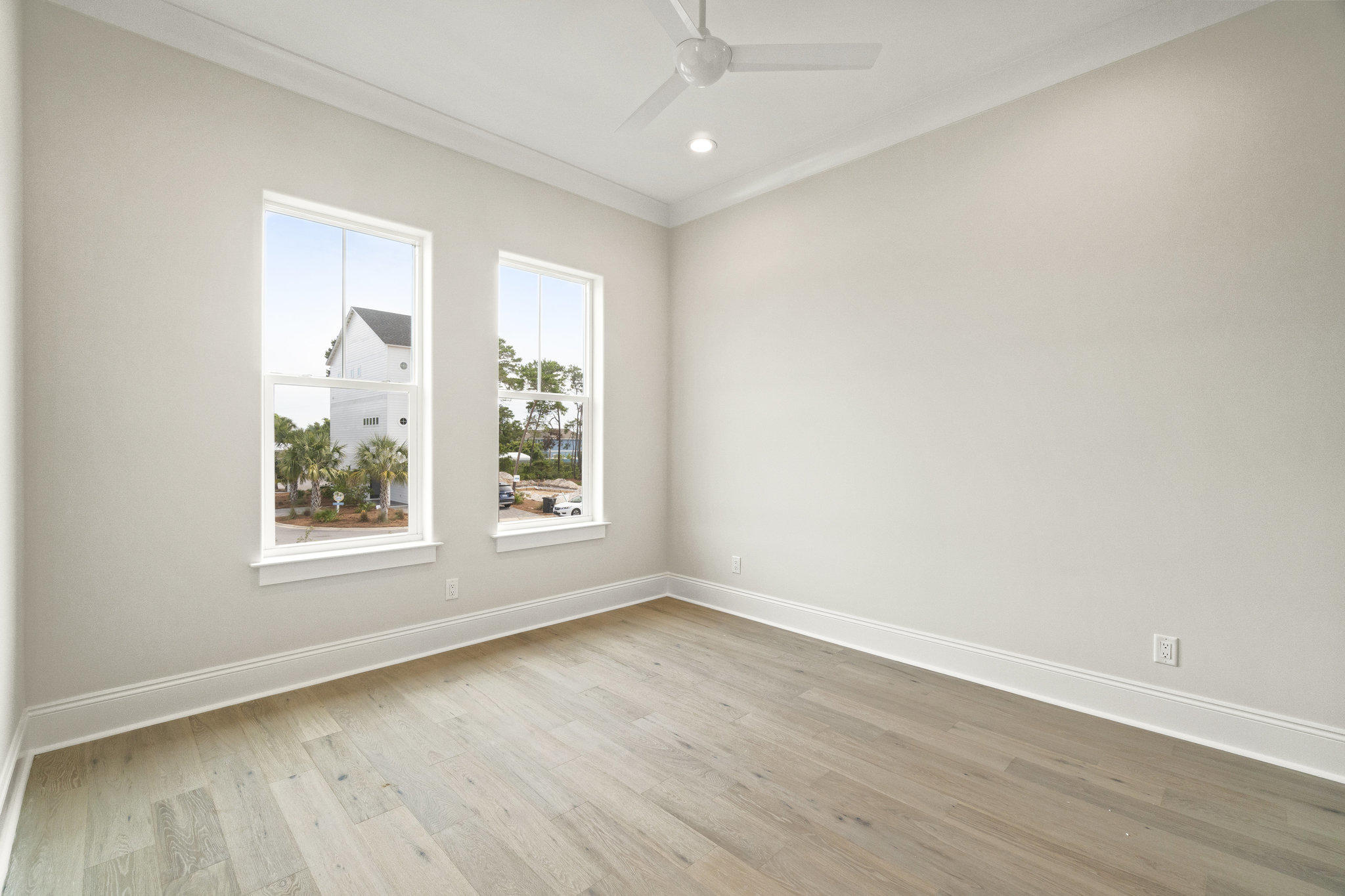 25 Sunset Key Inlet Beach, FL 32461 - Photo 21 of 32 an empty room with wooden floor and windows