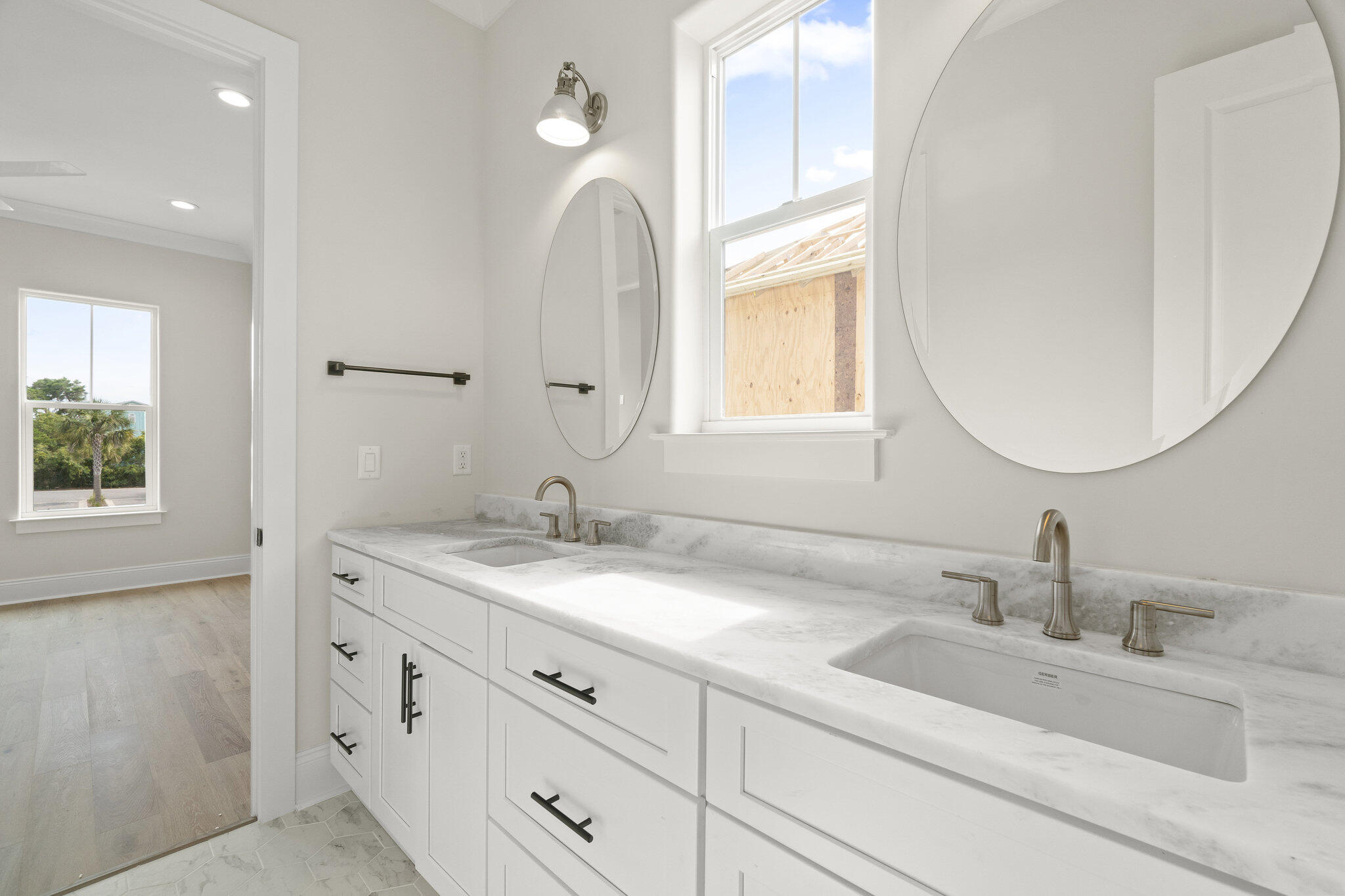 25 Sunset Key Inlet Beach, FL 32461 - Photo 25 of 32 a bathroom with a sink and a mirror