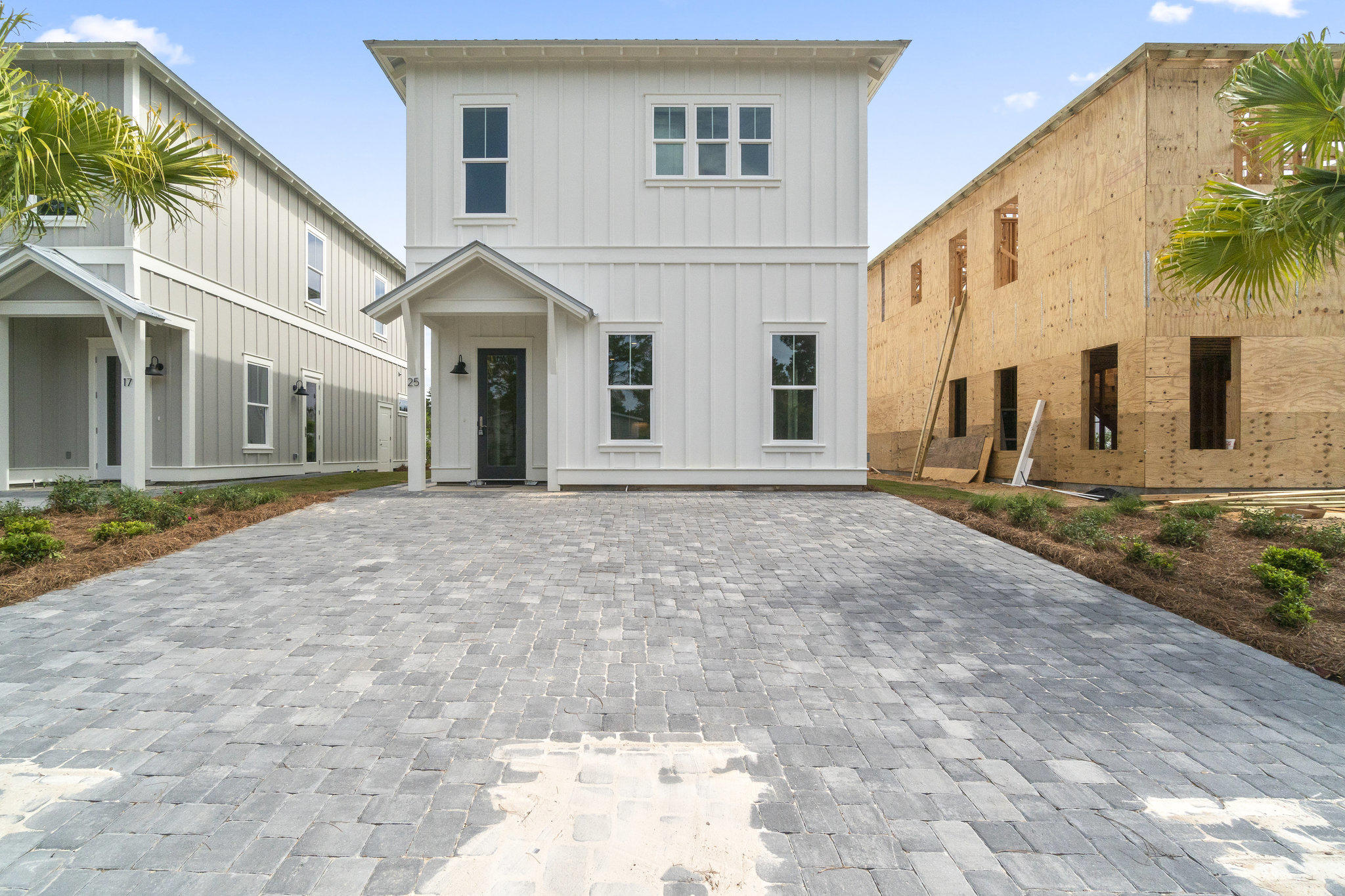 25 Sunset Key Inlet Beach, FL 32461 - Photo 30 of 32 a view of a white house with a yard