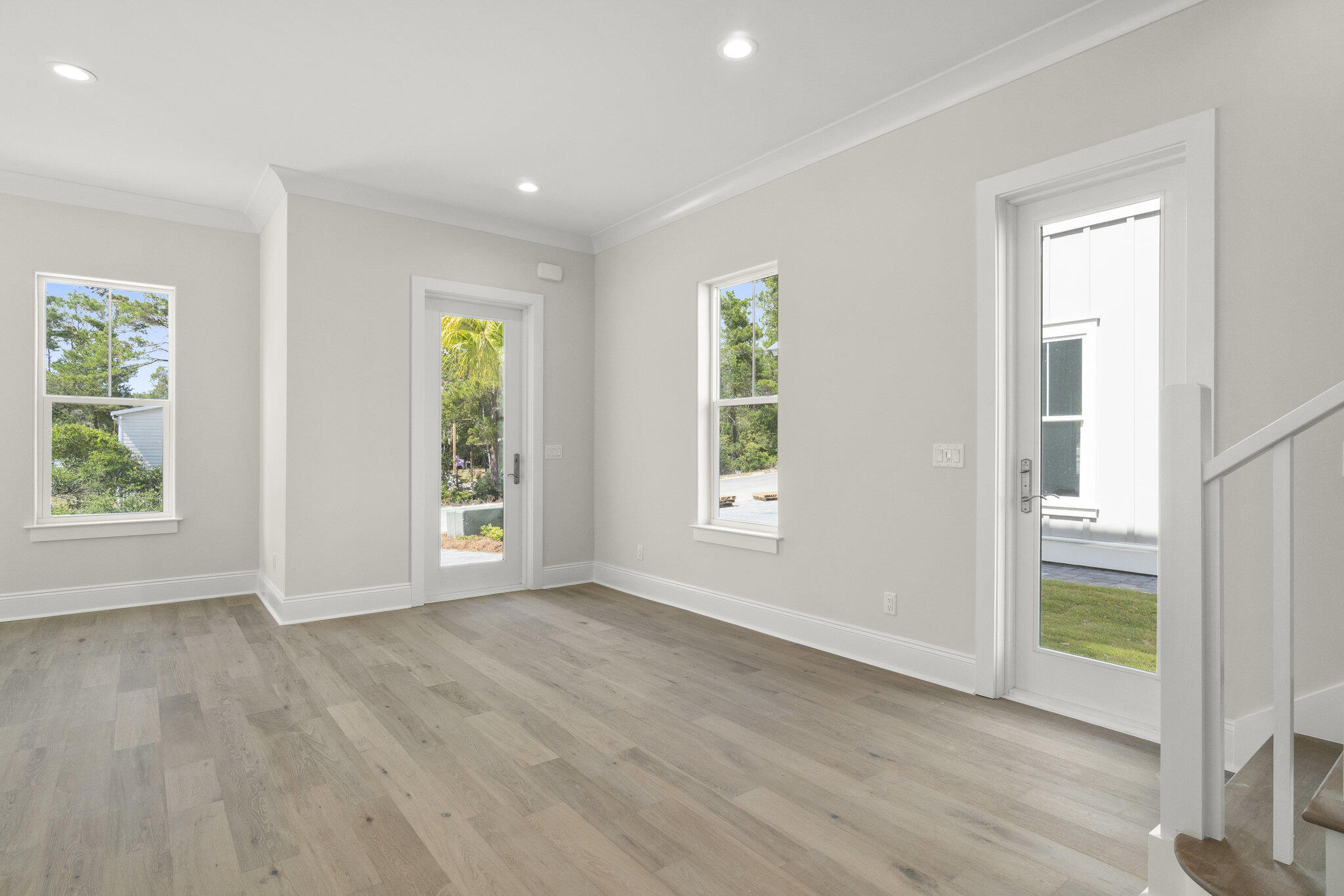 25 Sunset Key Inlet Beach, FL 32461 - Photo 3 of 32 an empty room with wooden floor and windows