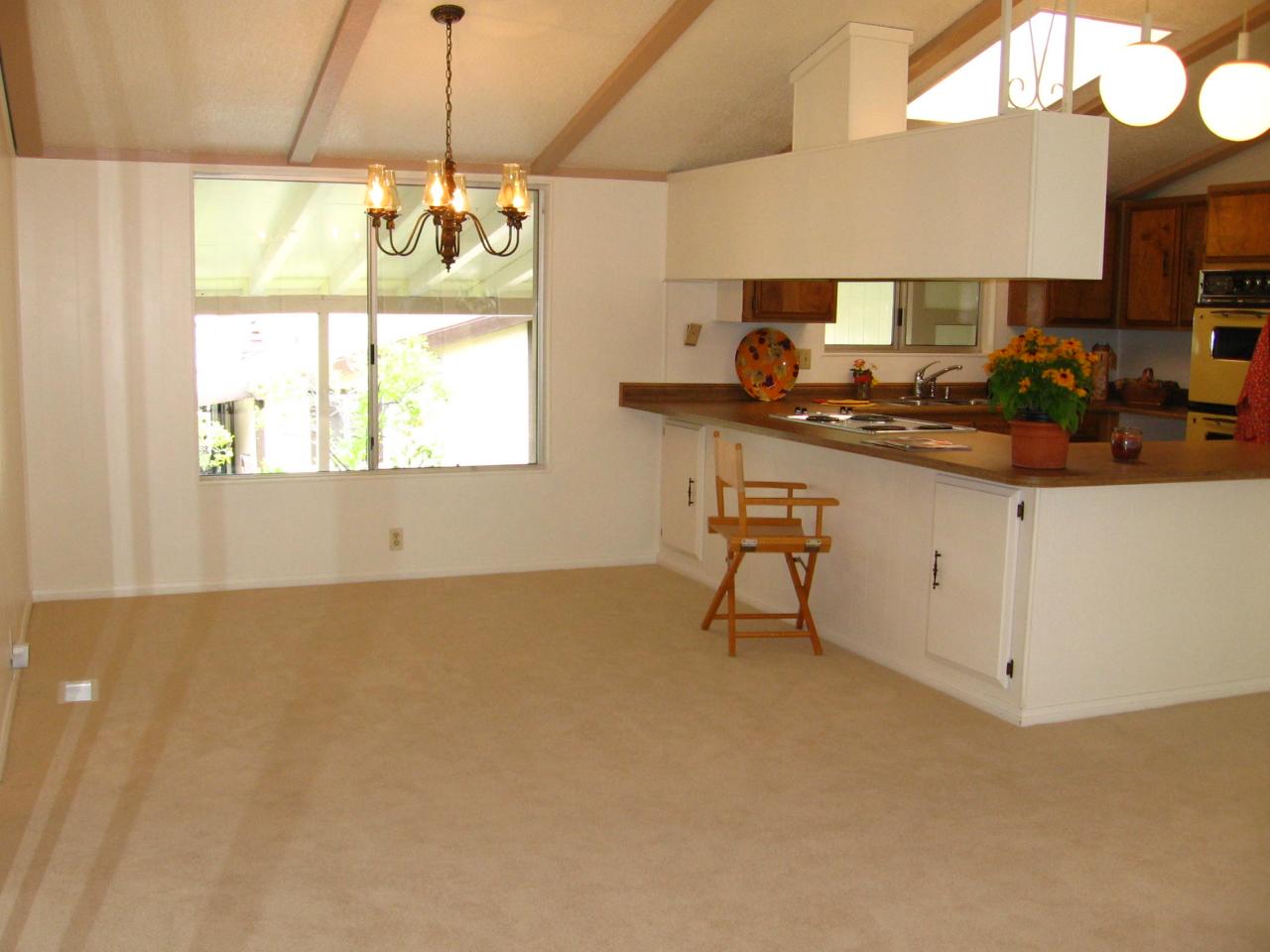 340 Old Mill Road, Unit 181 Santa Barbara, CA 93110 - Photo 4 of 20 a kitchen with stainless steel appliances granite countertop a sink and a stove