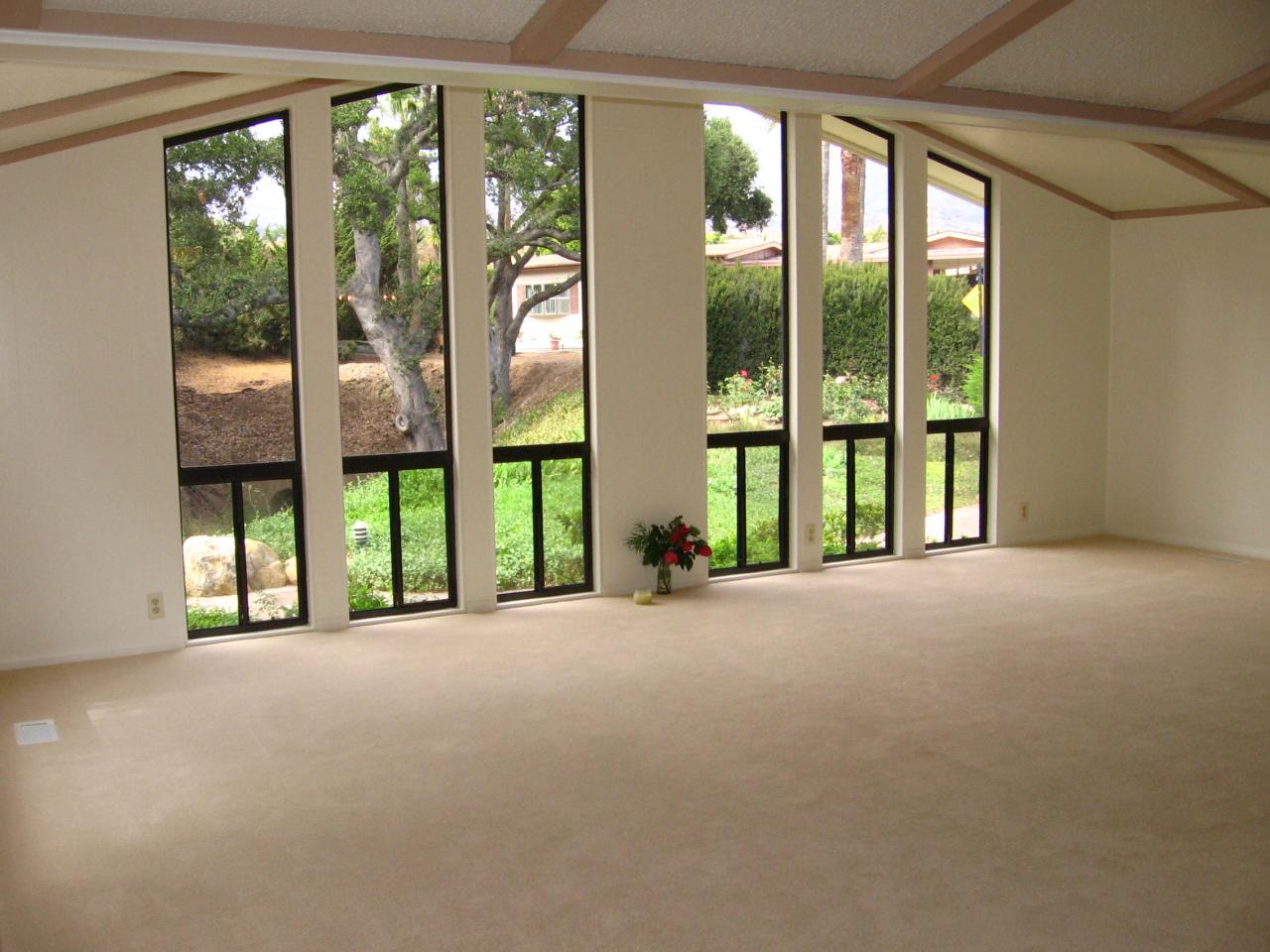 340 Old Mill Road, Unit 181 Santa Barbara, CA 93110 - Photo 5 of 20 a view of an empty room with windows and balcony