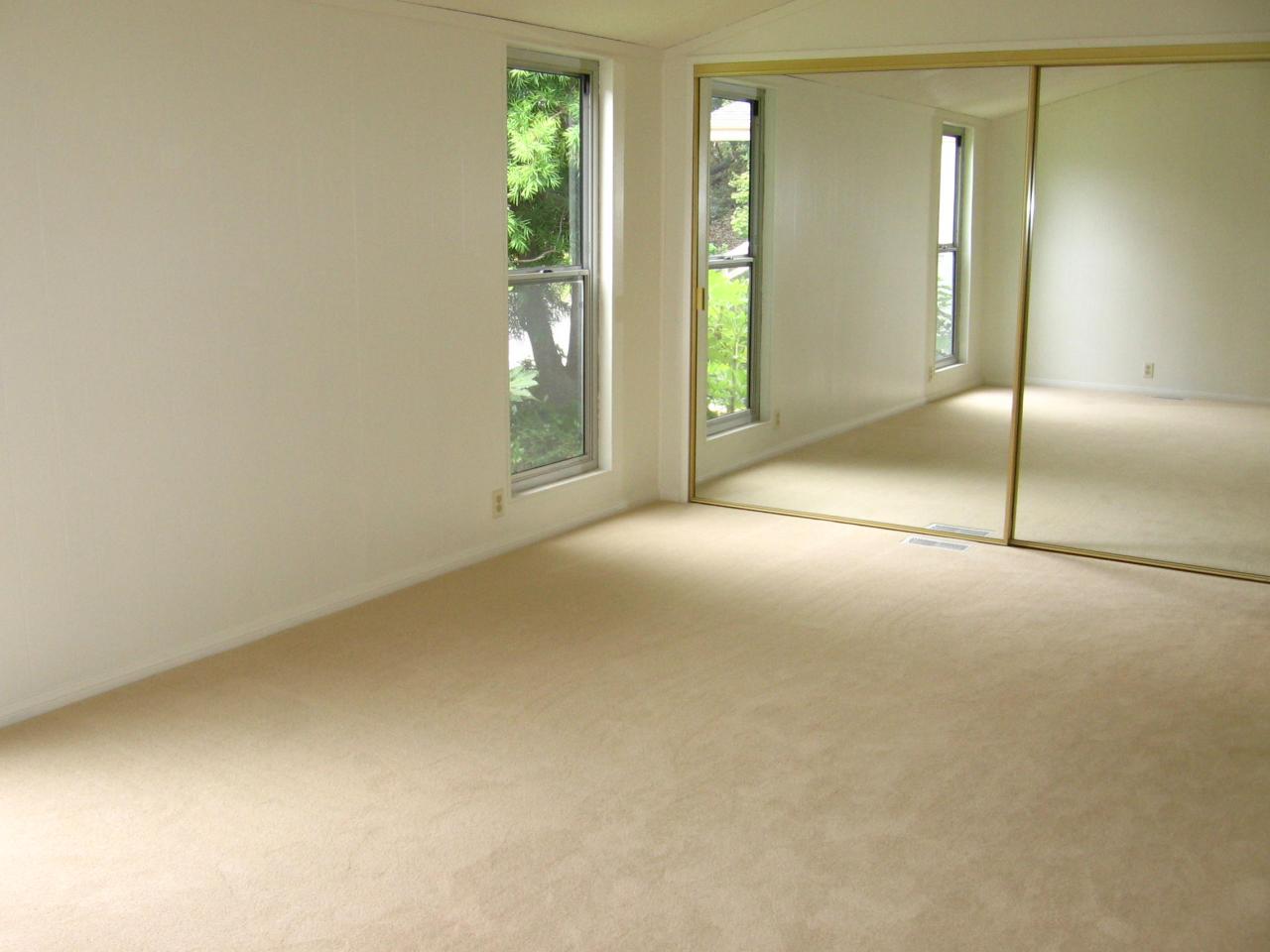340 Old Mill Road, Unit 181 Santa Barbara, CA 93110 - Photo 7 of 20 an empty room with closet and windows