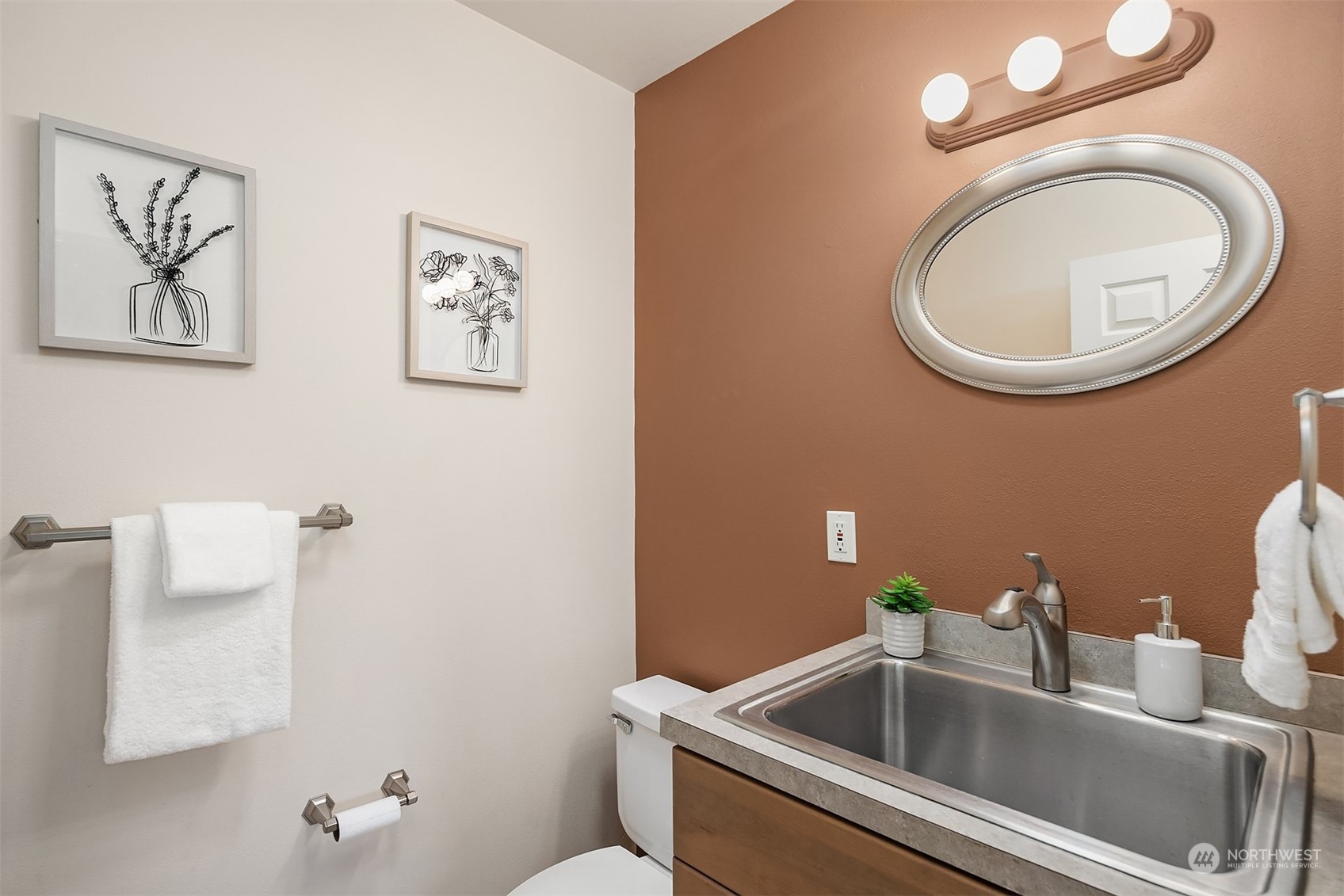 11302 East Riverside Drive Bothell, WA 98011 - Photo 21 of 37 a bathroom with a toilet and a sink