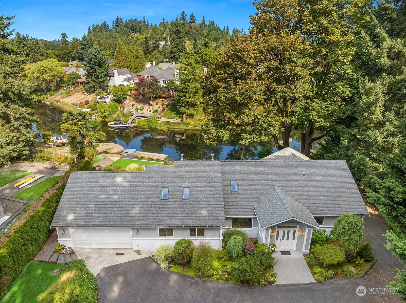 11302 East Riverside Drive Bothell, WA 98011 - Photo 3 of 37 an aerial view of a house with a yard