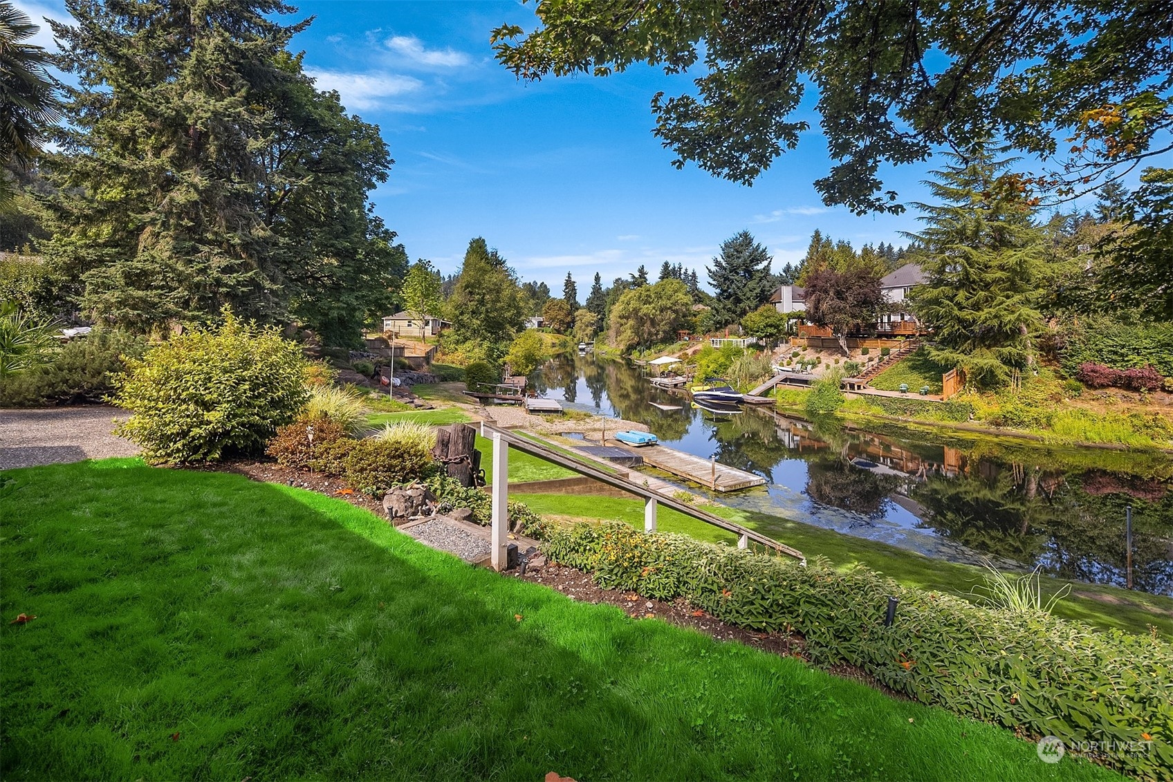 11302 East Riverside Drive Bothell, WA 98011 - Photo 33 of 37 a view of a yard with swimming pool