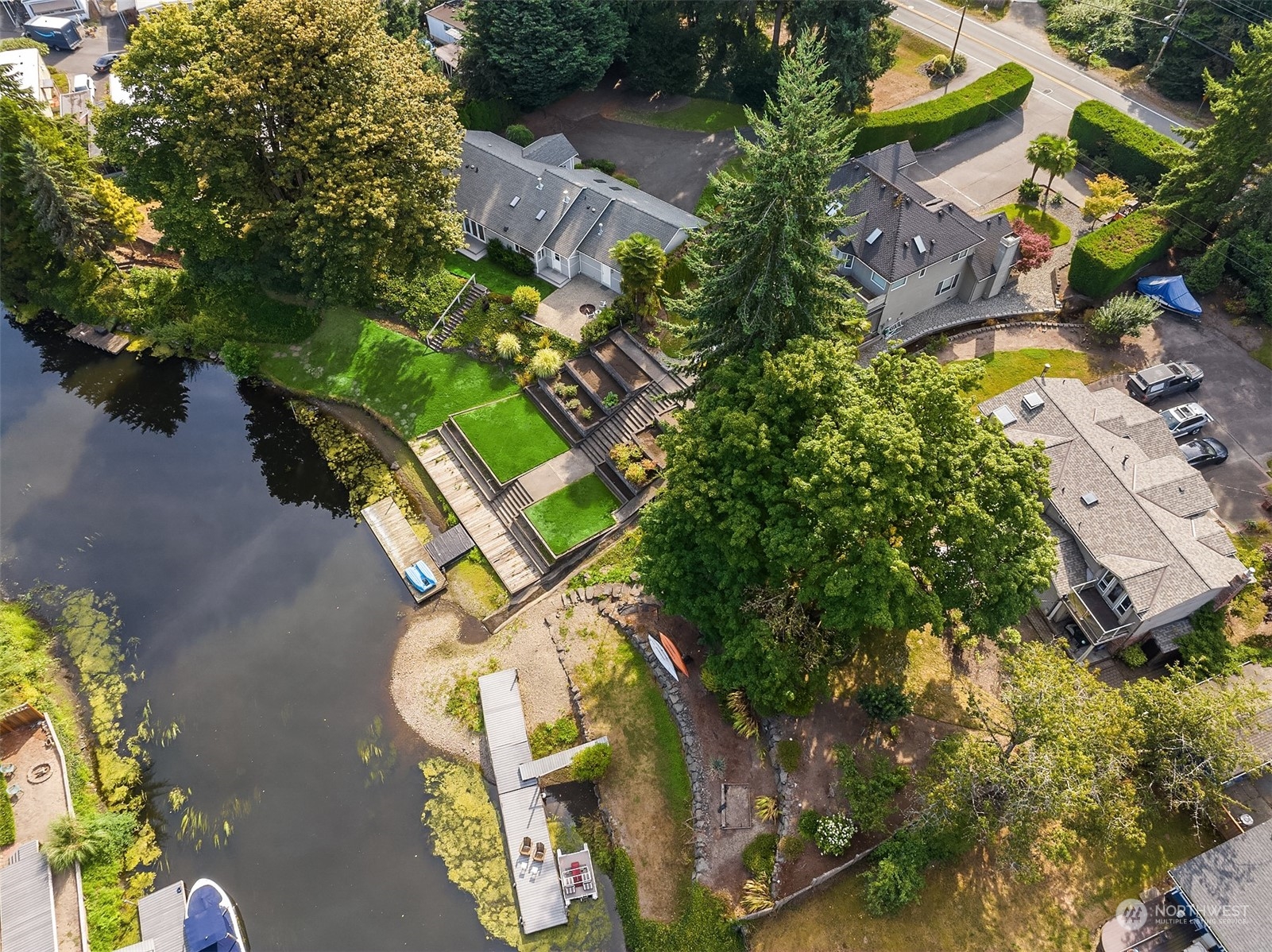 11302 East Riverside Drive Bothell, WA 98011 - Photo 35 of 37 an aerial view of a house with a yard and garden