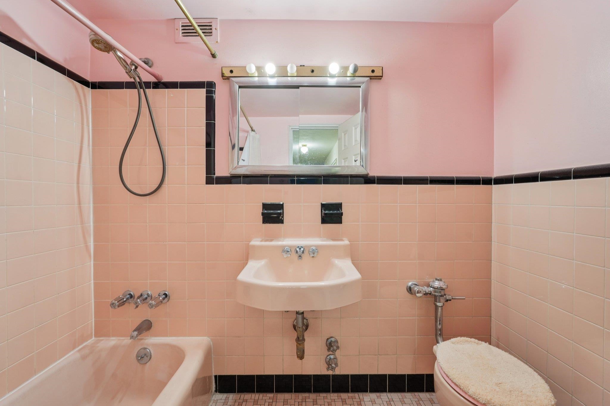 6010 Boulevard East, Unit 54 West New York, NJ 07093 - Photo 14 of 20 a bathroom with a sink toilet and shower