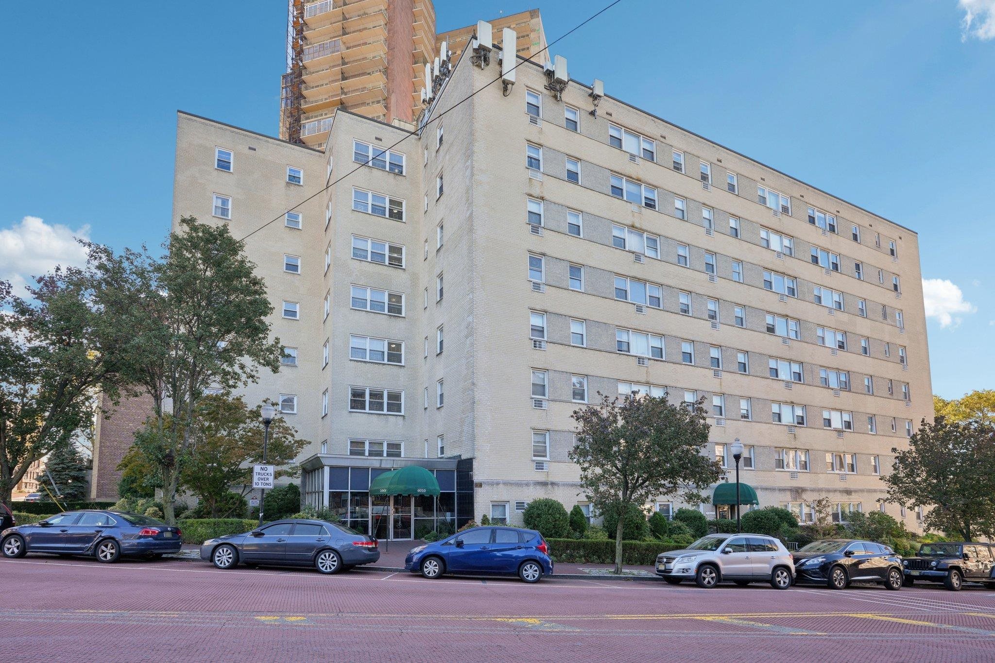 6010 Boulevard East, Unit 54 West New York, NJ 07093 - Photo 19 of 20 front view of a building with a street