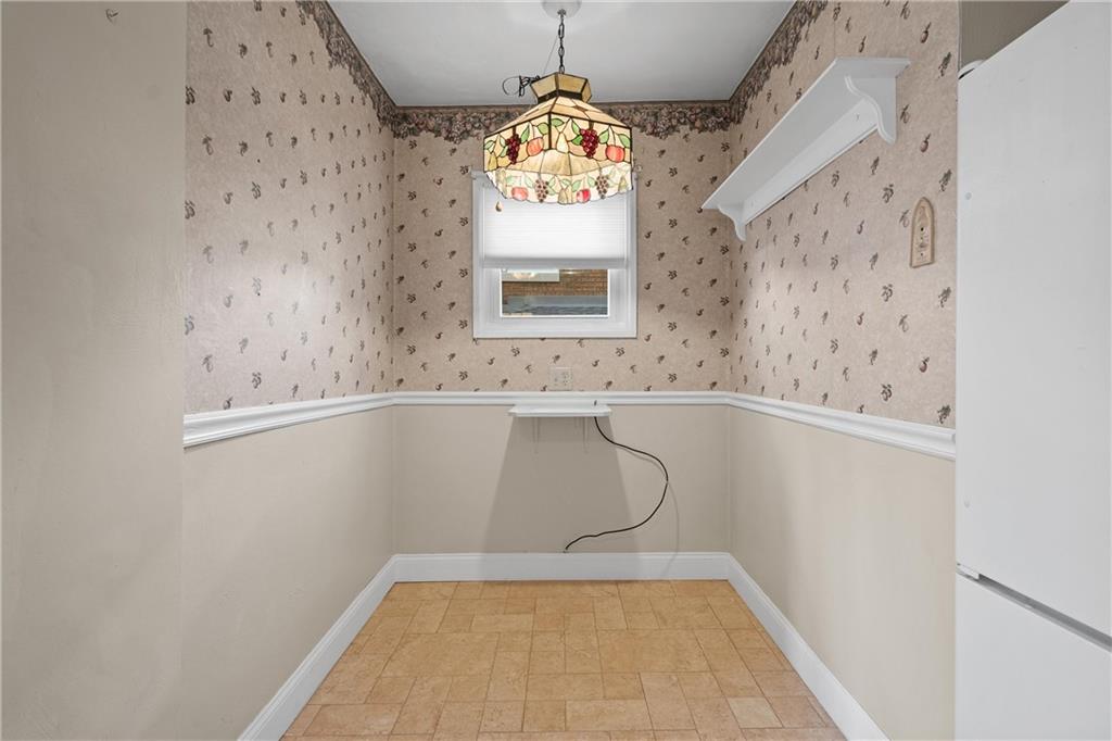 4004 Kleber Street Pittsburgh, PA 15212 - Photo 13 of 35 a bathroom with a window and a shower
