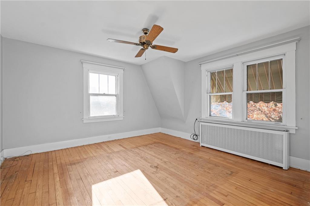4004 Kleber Street Pittsburgh, PA 15212 - Photo 15 of 35 a view of empty room with wooden floor and fan