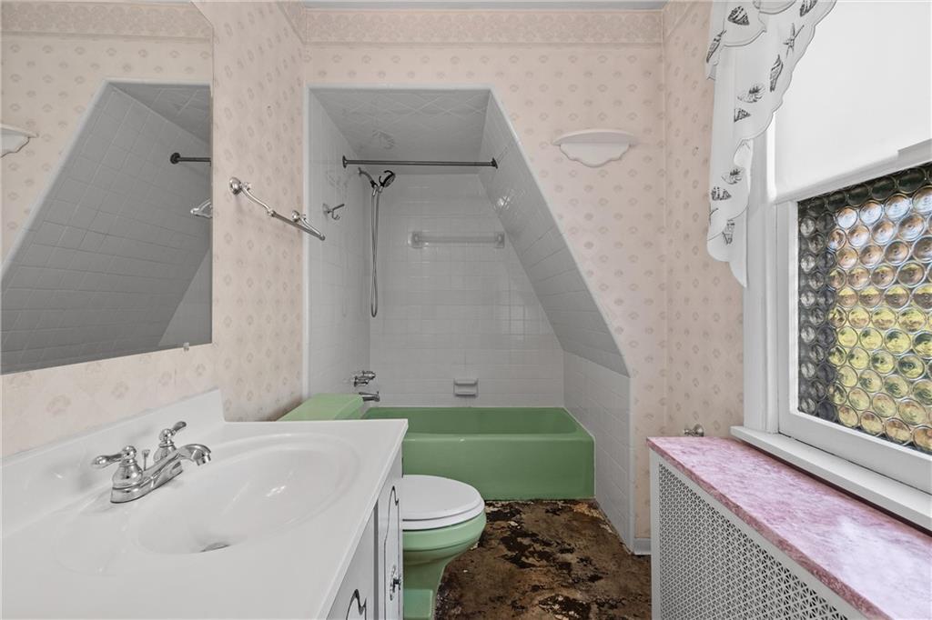 4004 Kleber Street Pittsburgh, PA 15212 - Photo 18 of 35 a bathroom with a sink and a mirror