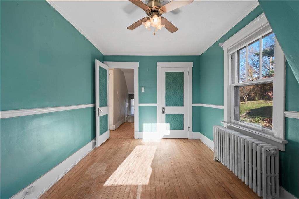 4004 Kleber Street Pittsburgh, PA 15212 - Photo 20 of 35 a view of a room with wooden floor fan and windows