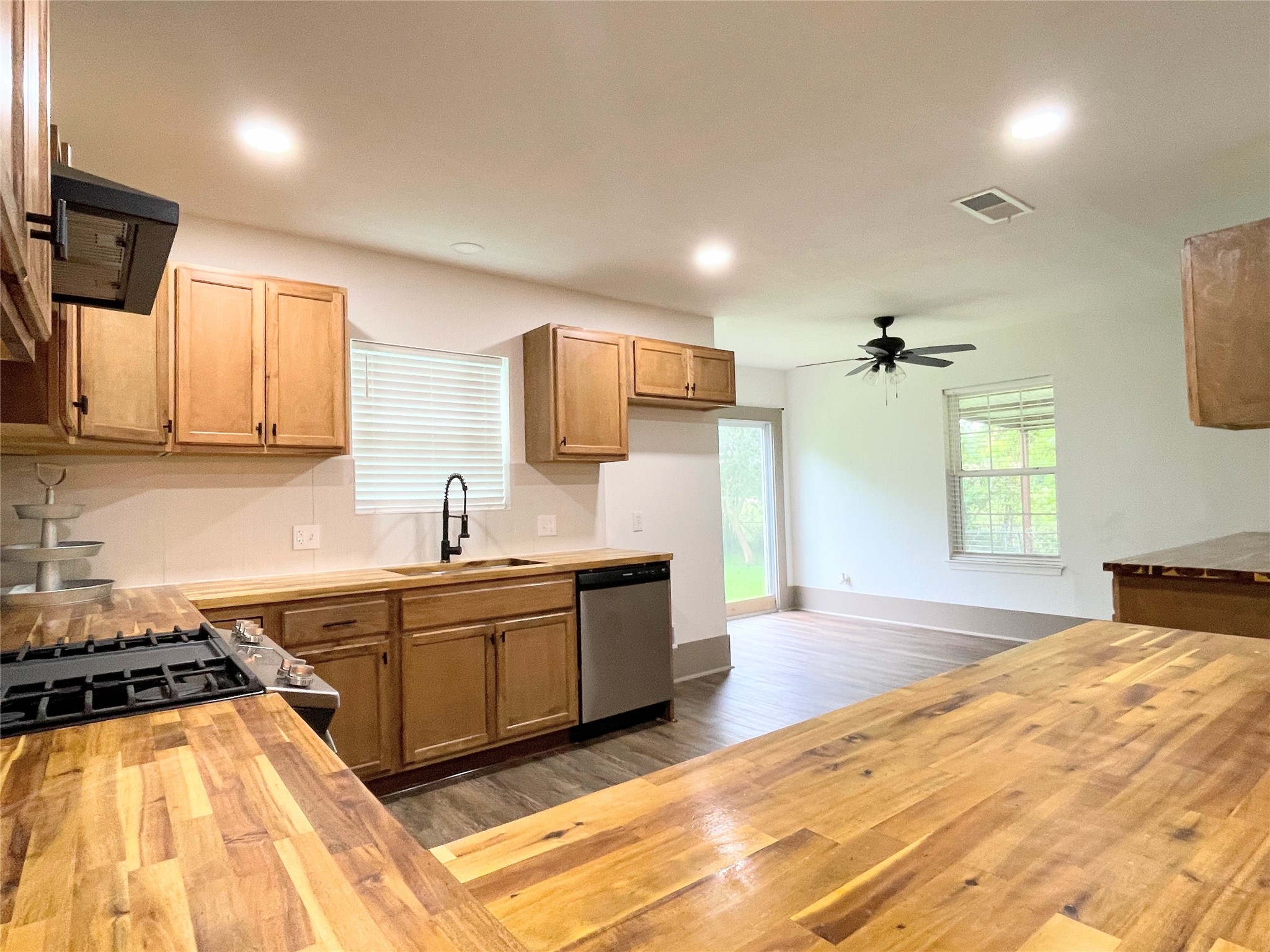 210 Crescent Drive Trinity, TX 75862 - Photo 14 of 33 Beautiful butcher block countertops in kitchen