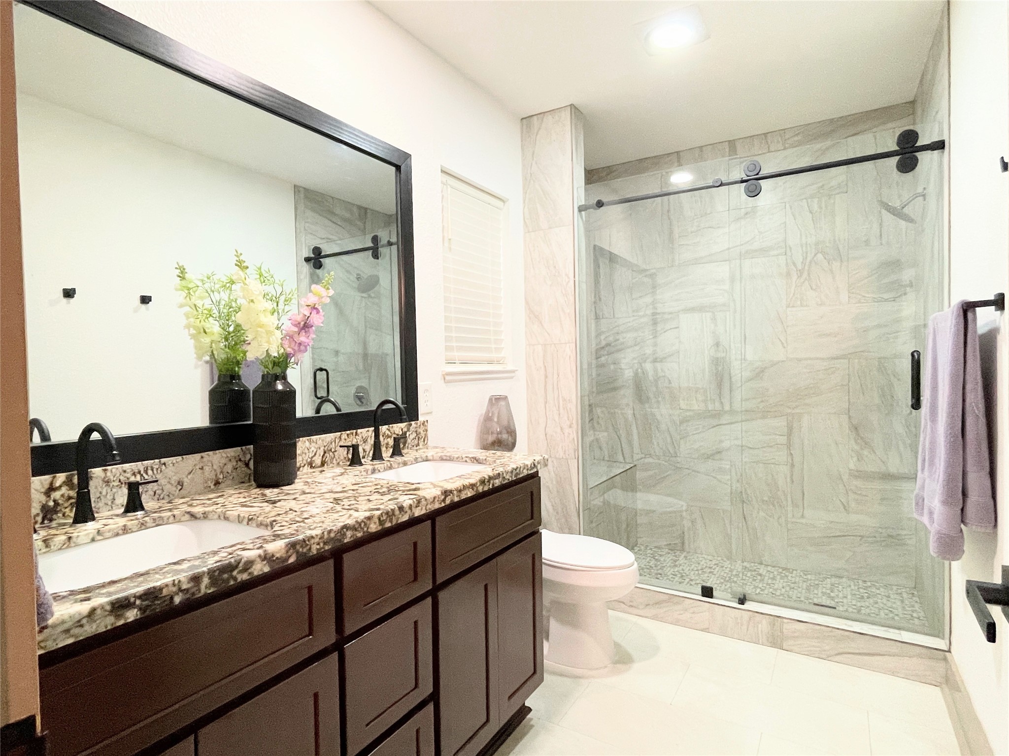 210 Crescent Drive Trinity, TX 75862 - Photo 18 of 33 Primary bath with double sinks and large custom shower.