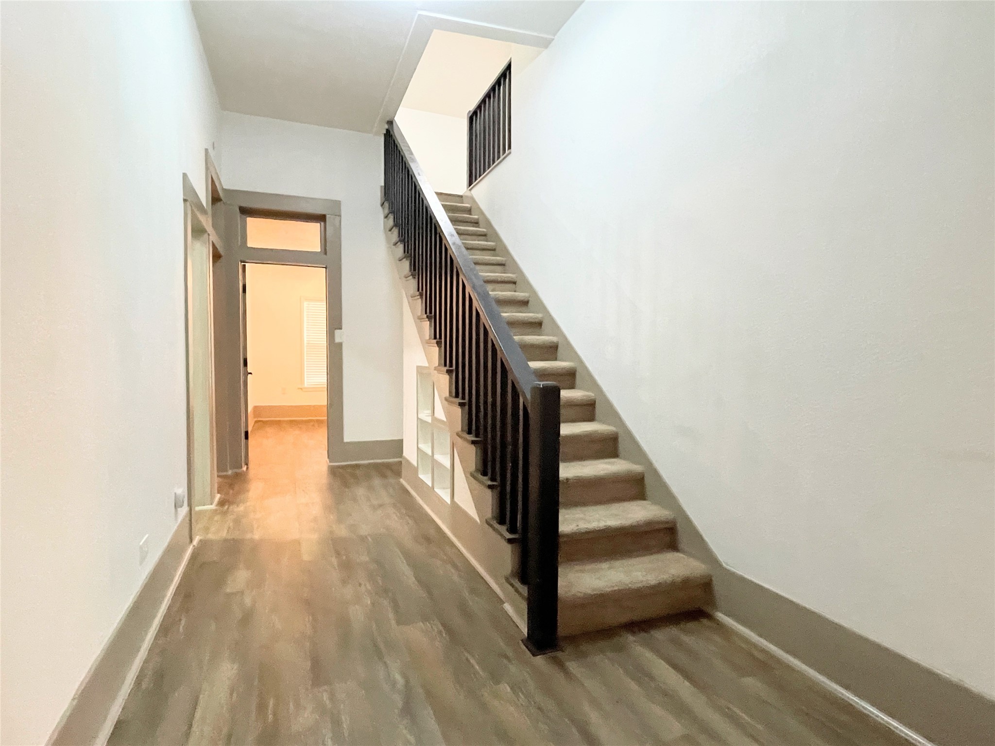 210 Crescent Drive Trinity, TX 75862 - Photo 23 of 33 Hallway and stairs to second floor