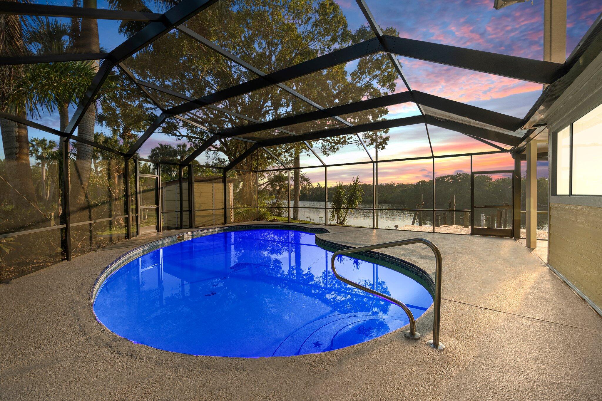 611 Southwest Timber Trail Stuart, FL 34997 - Photo 42 of 56 Pool Sunset
