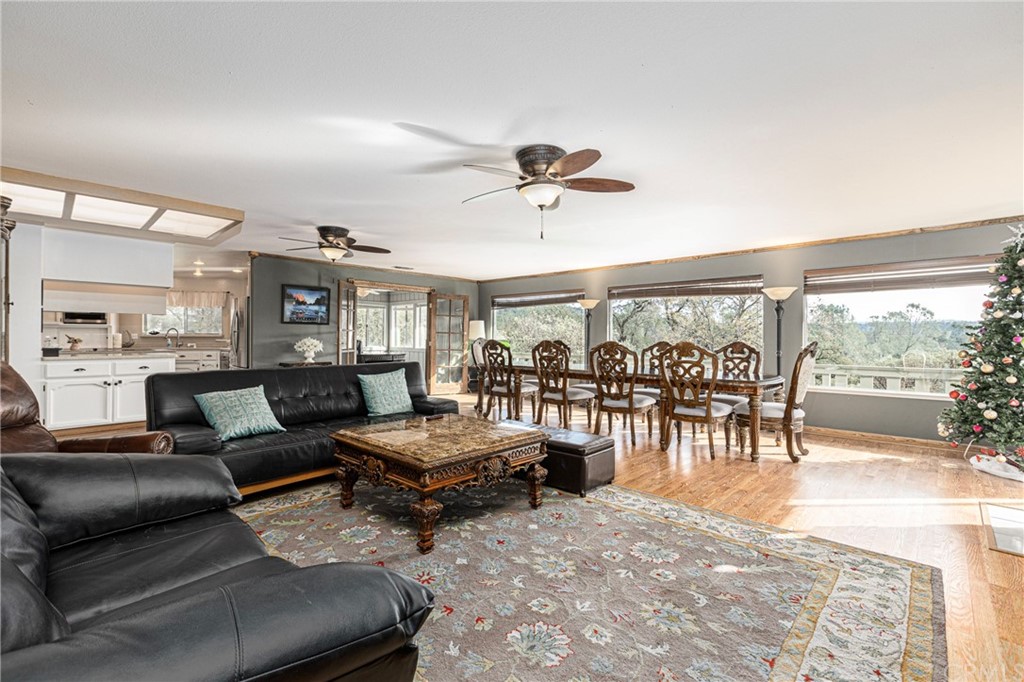 45943 Black Oak Road Coarsegold, CA 93614 - Photo 16 of 64 a living room with furniture and a large window