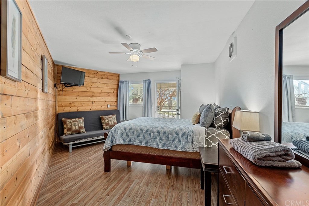 45943 Black Oak Road Coarsegold, CA 93614 - Photo 39 of 64 a bedroom with a bed and a couch