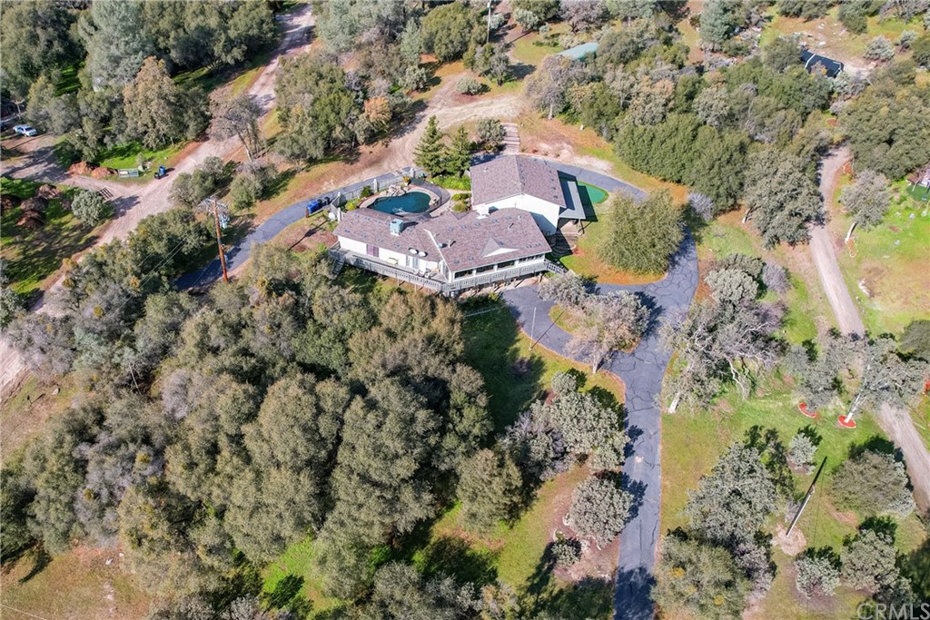 45943 Black Oak Road Coarsegold, CA 93614 - Photo 4 of 64 an aerial view of house with yard and mountain view in back