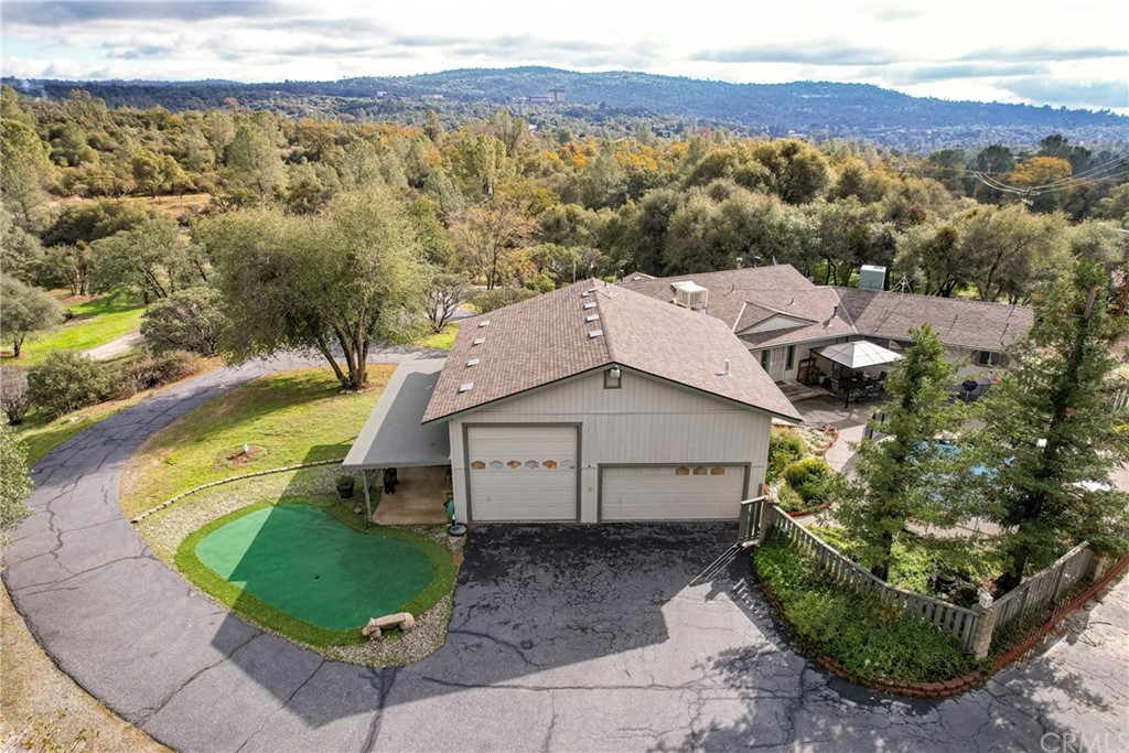 45943 Black Oak Road Coarsegold, CA 93614 - Photo 6 of 64 a view of a house with a yard