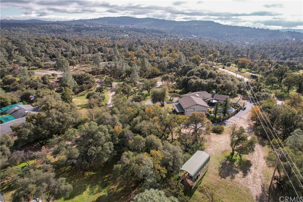 45943 Black Oak Road Coarsegold, CA 93614 - Photo 64 of 64 an aerial view of residential houses with outdoor space