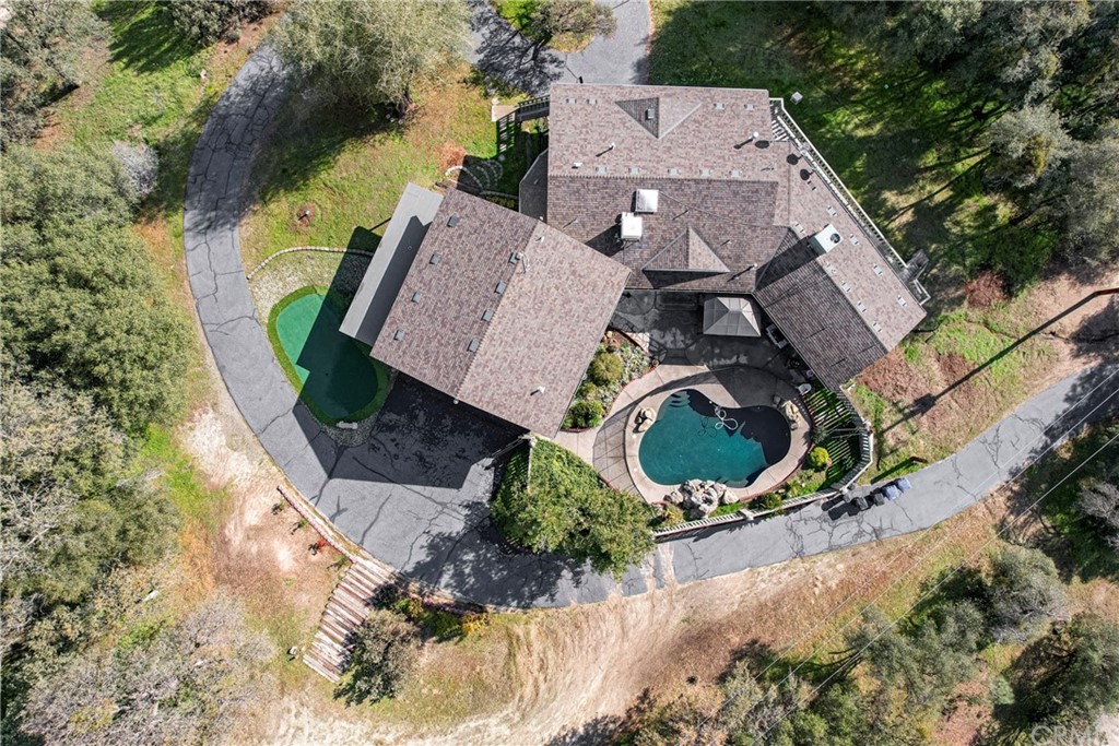 45943 Black Oak Road Coarsegold, CA 93614 - Photo 7 of 64 an aerial view of a house with outdoor space