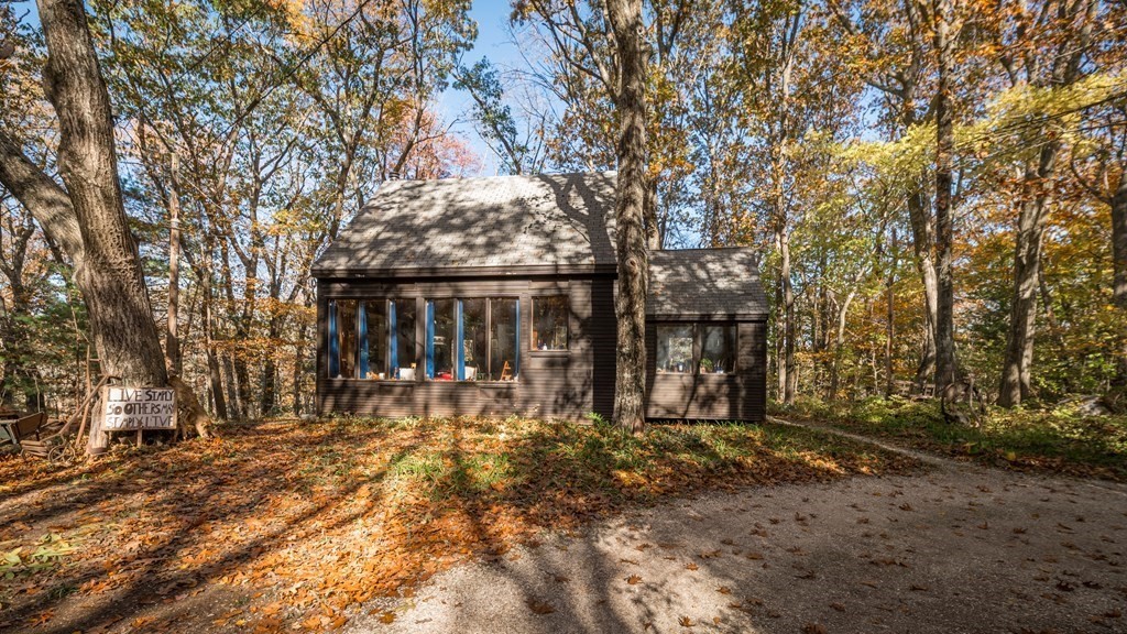 a backyard of a house with lots of green space