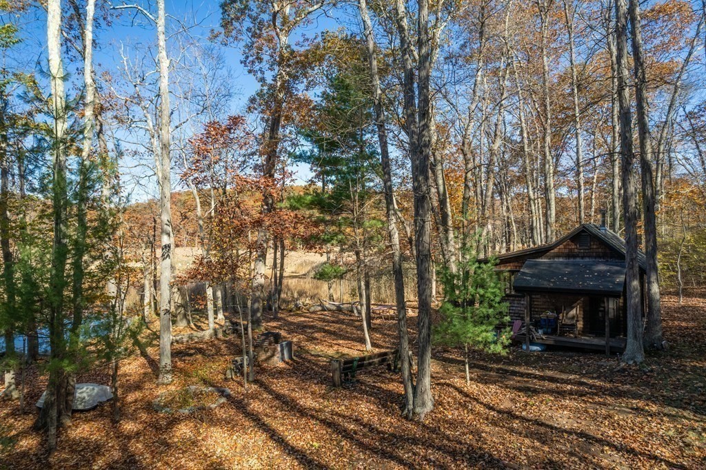 24 Paradise Road Ipswich, MA 01938 - Photo 16 of 27 a front view of a house with a yard