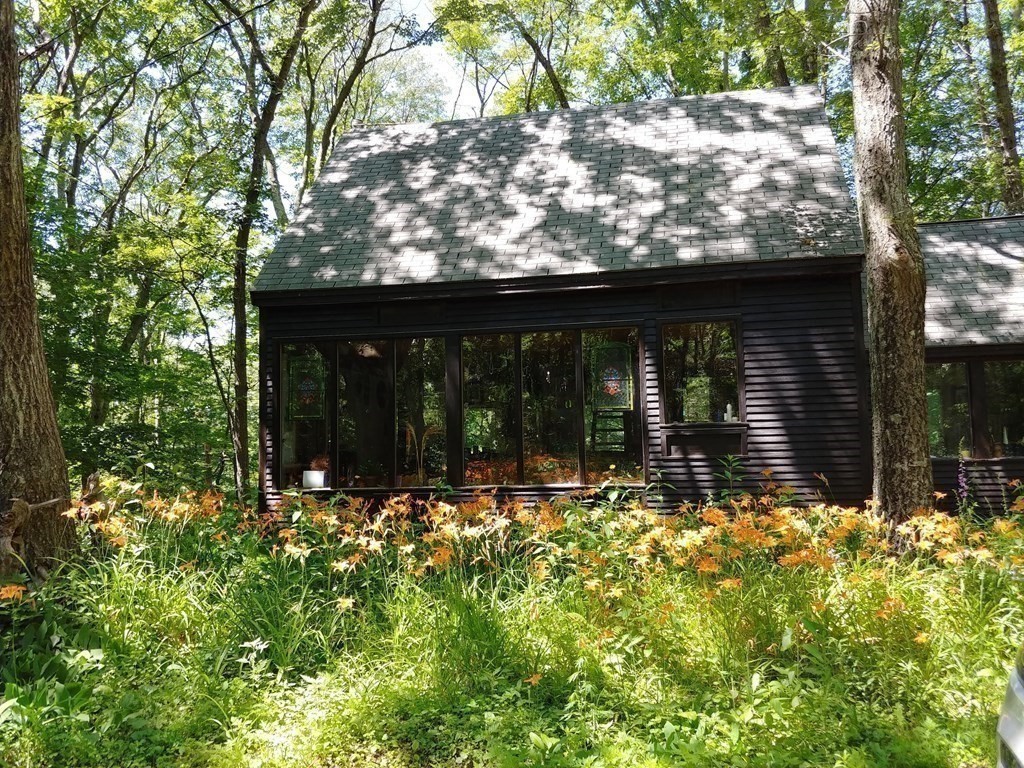 24 Paradise Road Ipswich, MA 01938 - Photo 25 of 27 front view of house with a outdoor space