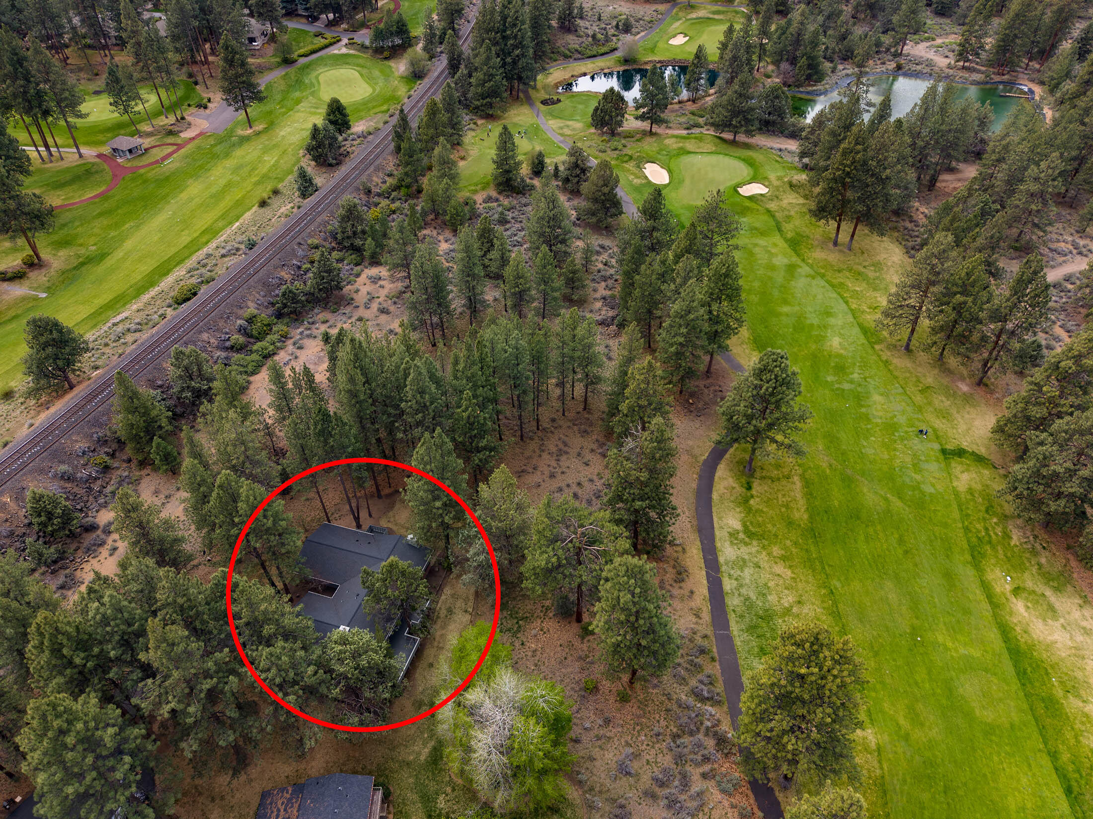 20316 Donkey Sled Road Bend, OR 97702 - Photo 45 of 50 a backyard of a house with outdoor seating