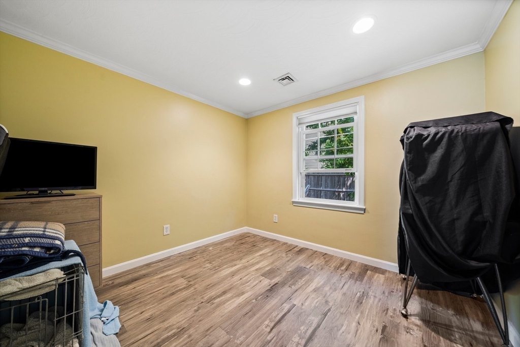 12 Richard Road Natick, MA 01760 - Photo 18 of 42 a view of a livingroom with furniture and staircase