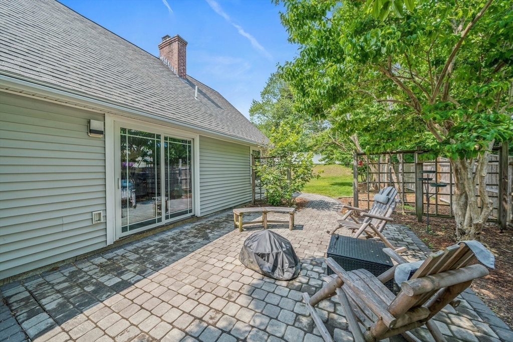 12 Richard Road Natick, MA 01760 - Photo 38 of 42 a view of backyard with outdoor seating and plants