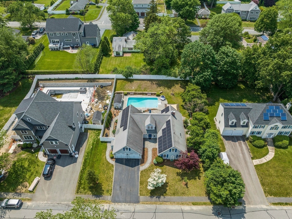 12 Richard Road Natick, MA 01760 - Photo 4 of 42 an aerial view of a house with a swimming pool