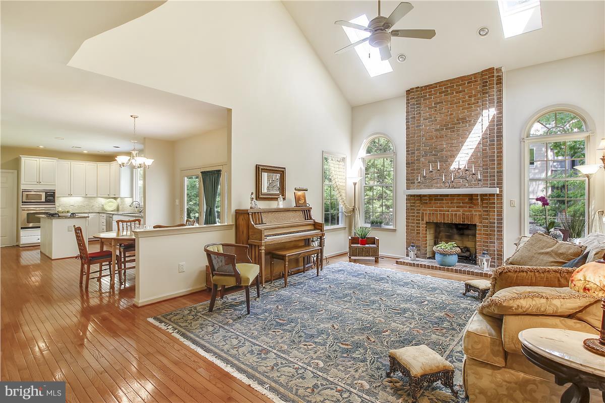 8006 Boulder Ridge Way Gaithersburg, MD 20882 - Photo 4 of 30 Gas log fireplace and two skylights