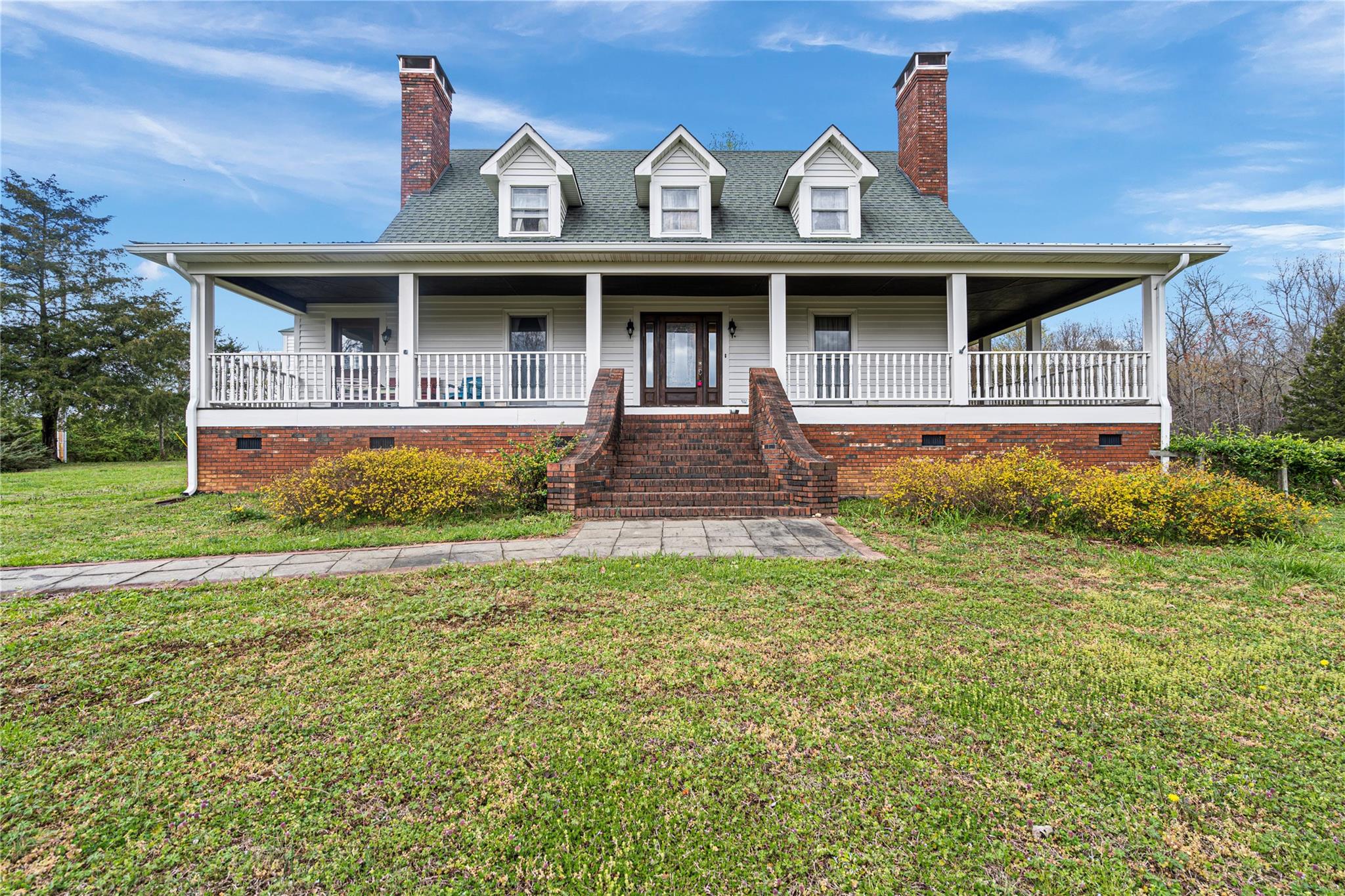 6627 Smith Road Stanfield, NC 28163 - Photo 34 of 40 a front view of a house with garden