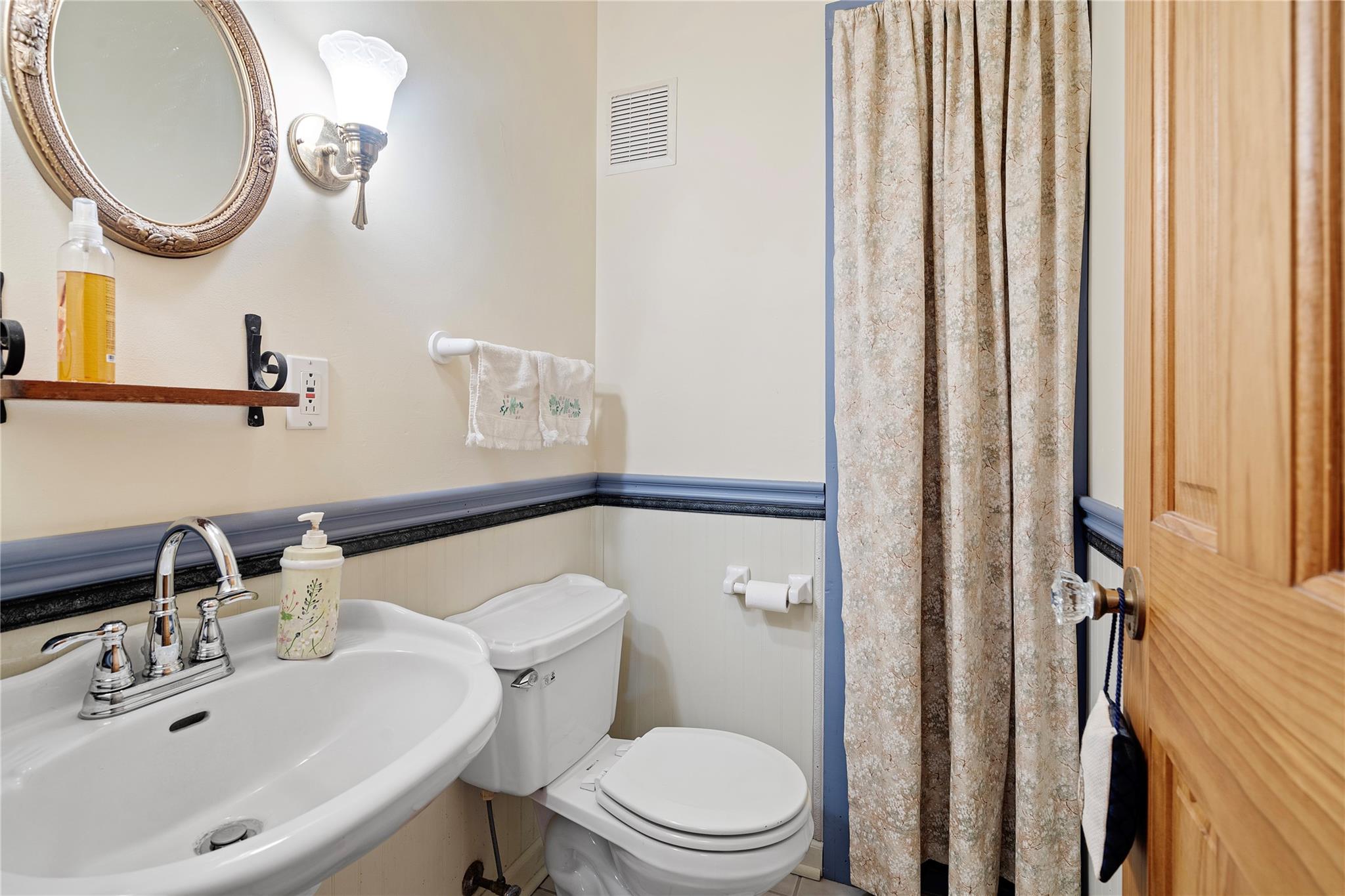 6627 Smith Road Stanfield, NC 28163 - Photo 7 of 40 a bathroom with a sink and a mirror