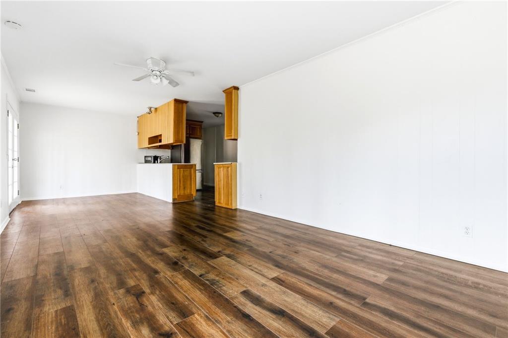 45 Chaffin Road Roswell, GA 30075 - Photo 12 of 26 a view of a room with wooden floor