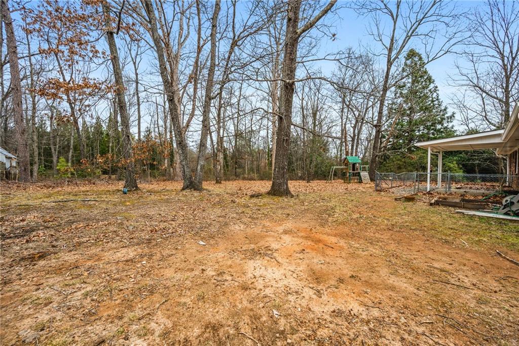 45 Chaffin Road Roswell, GA 30075 - Photo 24 of 26 a view of outdoor space with trees