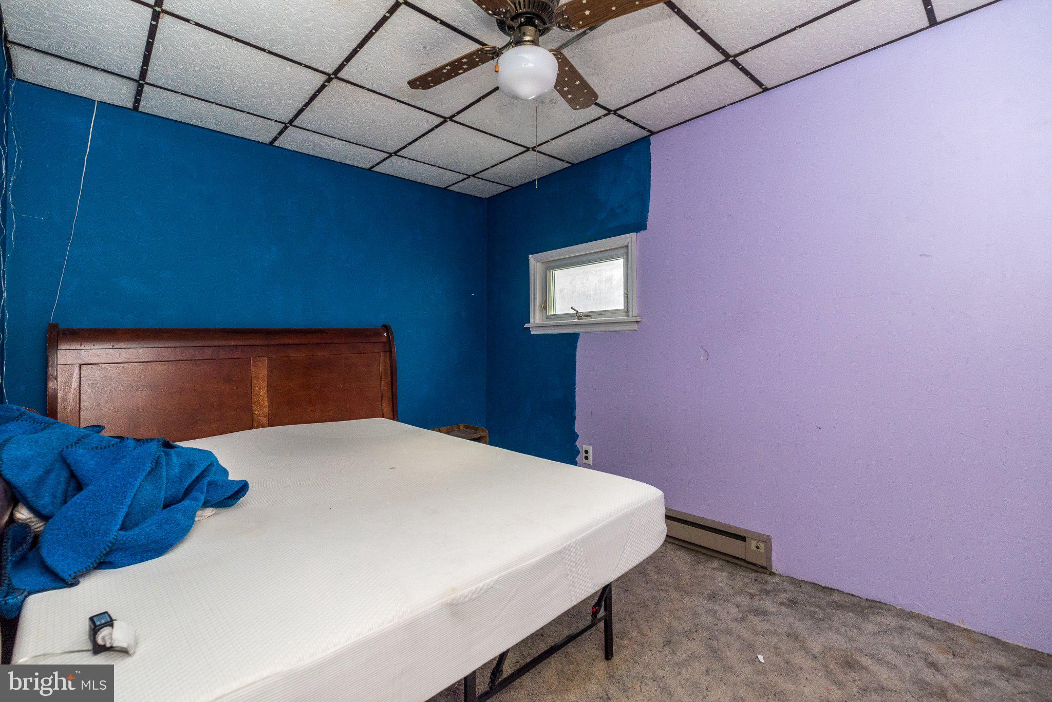 514 McKnight Street Gordon, PA 17921 - Photo 18 of 22 Vibrant hues in a cozy bedroom retreat.