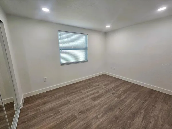 a bathroom with a sink toilet tub and shower