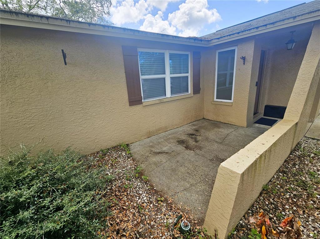 12218 Shadow Ridge Boulevard Hudson, FL 34669 - Photo 4 of 34 a view of front door