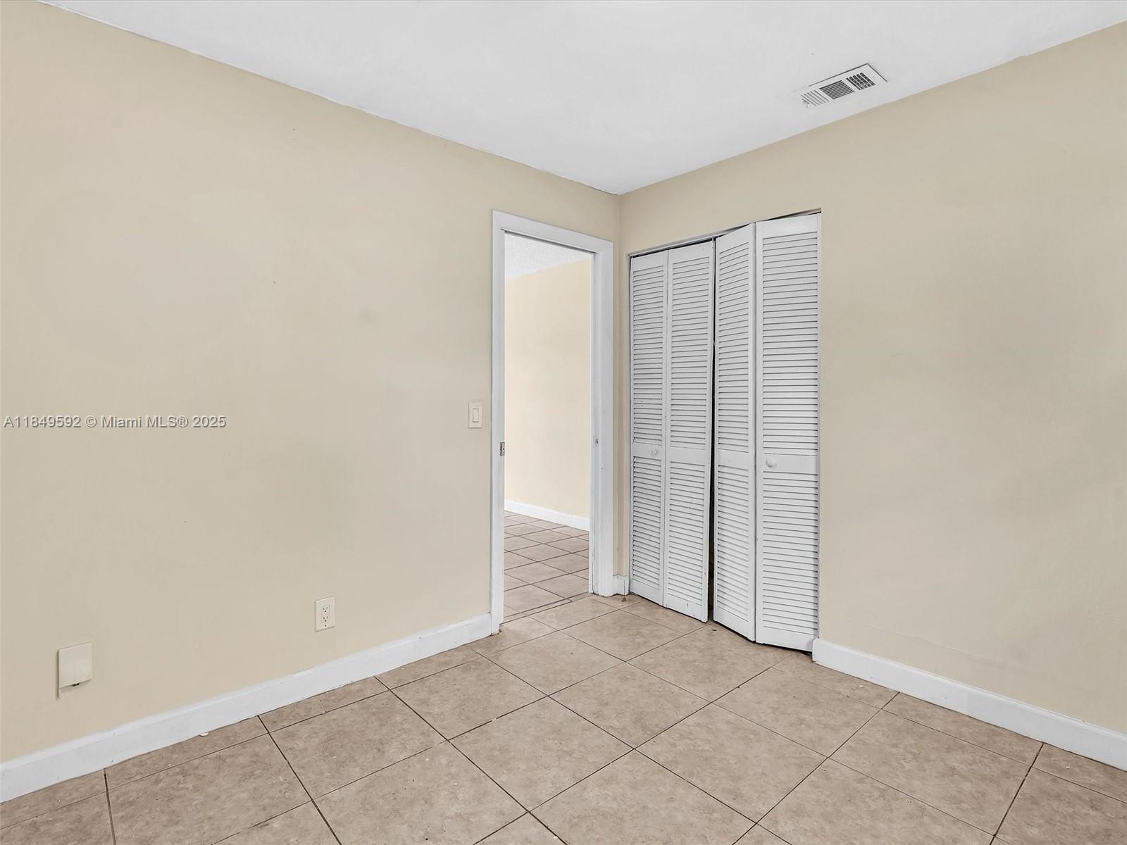 5611 Southwest 37th Street, Unit 1 Davie, FL 33314 - Photo 15 of 46 a view of an empty room