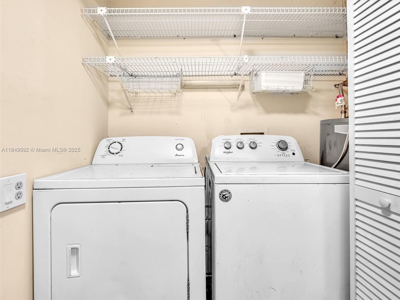 5611 Southwest 37th Street, Unit 1 Davie, FL 33314 - Photo 32 of 46 a utility room with dryer and washer