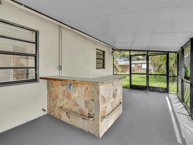 a view of an empty room with a sliding door