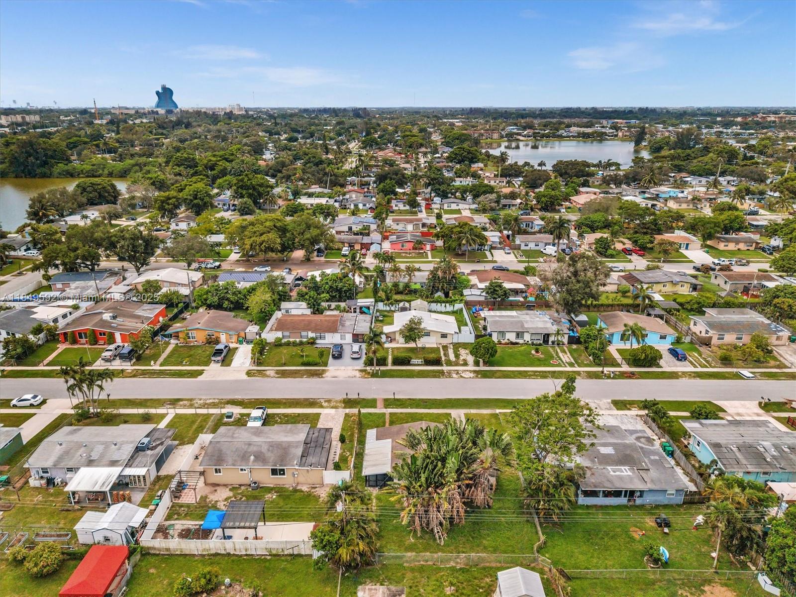 5611 Southwest 37th Street, Unit 1 Davie, FL 33314 - Photo 44 of 46 an aerial view of residential houses with outdoor space